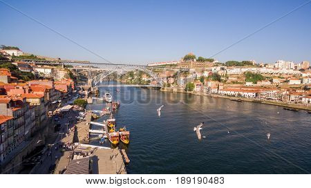 Aerial view over Porto's old town, Ribeira, Duoro river the and the Porto Bridge, Luiz I Bridge, 17 May 2017