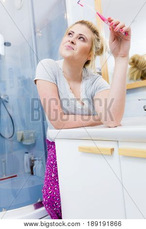 Woman Brushing Cleaning Teeth In Bathroom