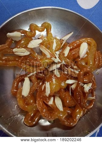 Indian sweet jalebi, indian dessert jalebi or imarti or imarati or jilbi with Almond