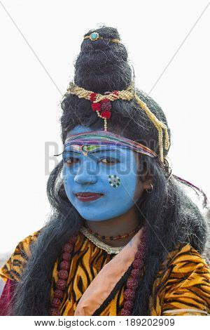 VARANASI INDIA - JANUARY 26 2017 : Children painted Shiva near Raj Ghat in Varanasi Uttar Pradesh India . Close up