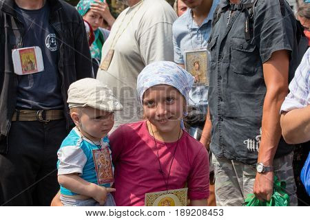 KIEV UKRAINE - JULY 27 2016 : Children and parishioners Ukrainian Orthodox Church Moscow Patriarchate in religious procession. At present there is war of Kiev Patriarchate and Moscow Patriarchate