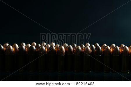 9mm bullets on the black mirror background