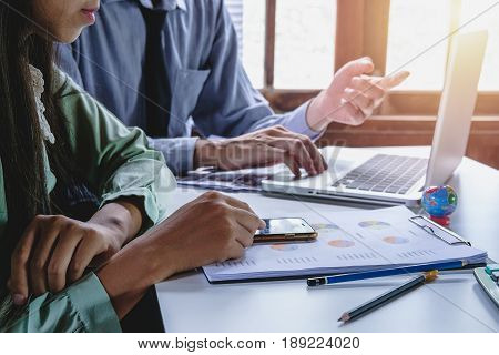 Business team meeting. Photo professional investor working new start up project.Analyzing income charts and graphs with modern laptop computer. Close up.Business analysis and strategy concept.
