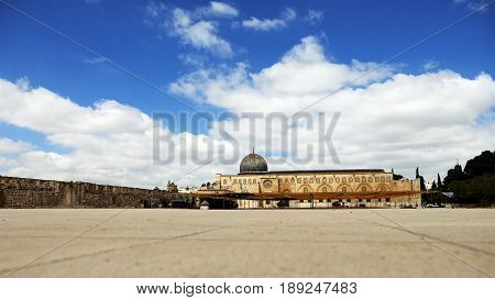 Al-Aqsa Mosque in Jerusalem on the top of the Temple Mount. Al Aqsa mosque is a sacred place for all muslims and islamic people.