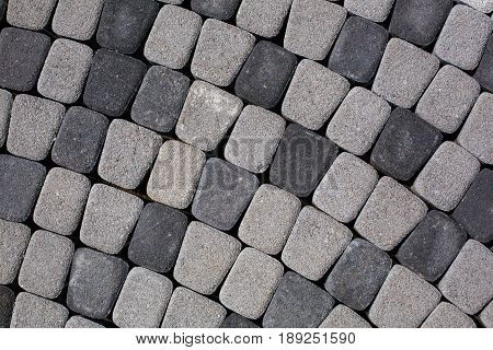 Stone path at the old town in Europe. Texture close up.