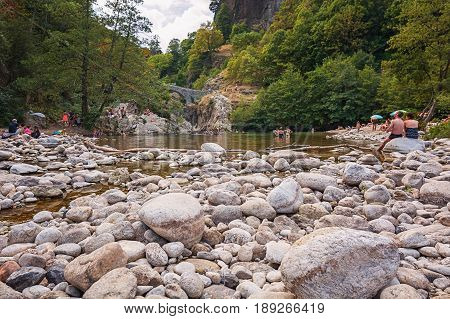 The Pont du Diable or Devil Bridge is a Roman bridge that spans the river Ardeche at about 10 m altitude. The bridge is located near the village of Thueyts in the Ardeche department in France
