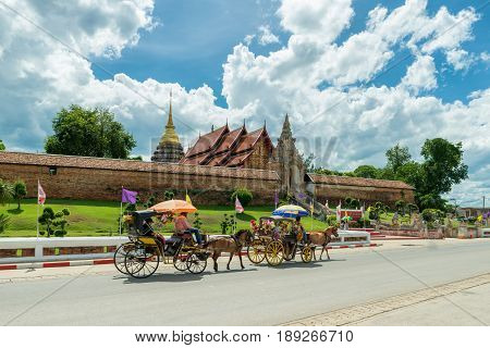 The horse carriage in Lampang at Wat Phra That Lampang Luang Lampang province in Thailand.