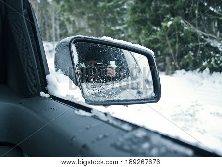 Mirror photo from the inside of a car.