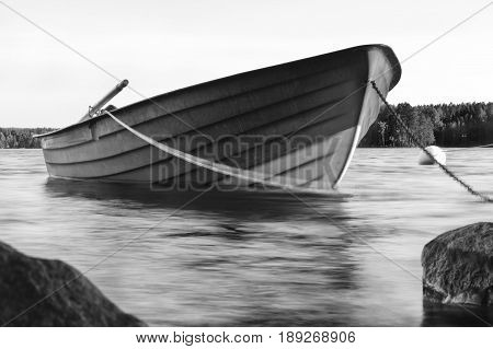 The wait. Boat floating in the water before fishing time
