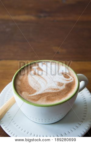 coffee cup and delicious cake strawberry and relax time moblie on table in coffee shop