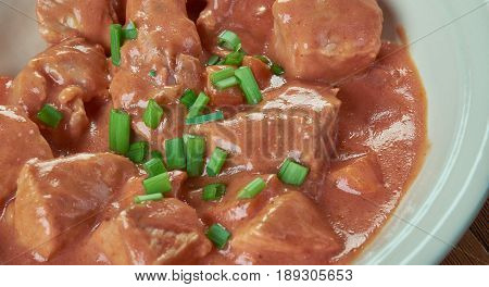 Schweinegulasch - German goulash in sauce close up