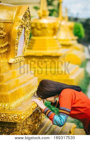 beautiful asian female at the buddist tample