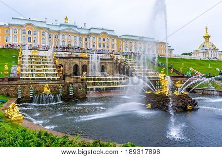 RUSSIA Peterhof - JULY 17 2013. The Grand Palace in Peterhof and the Samson Fountain