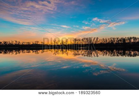 Wethersfield Meadows Sunrise landscape is mirrored in water