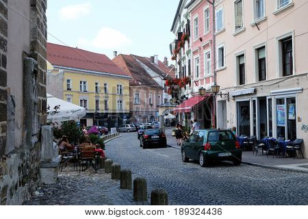 PTUJ, SLOVENIA - JULY 02: Medieval street in Ptuj, town on the Drava River banks, Lower Styria Region, Slovenia on July 02, 2016.