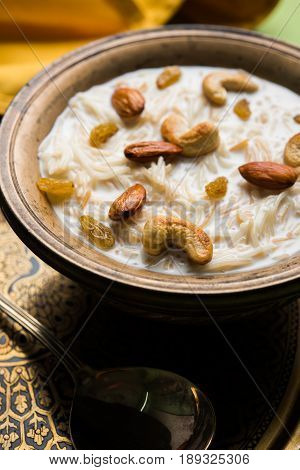 Most famous Indian sweet pudding Kheer or semiya khir in a bowl.Selective focus