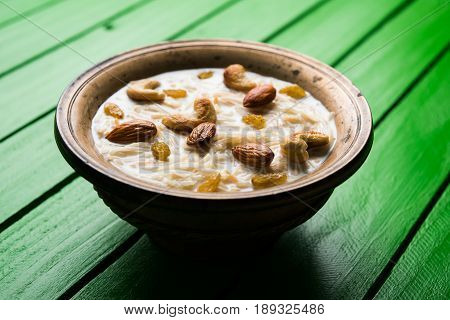 Most famous Indian sweet pudding Kheer or semiya khir in a bowl.Selective focus