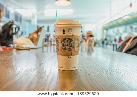 Kuala lumpur Malaysia MAY 24 2017: A Starbucks coffee and order name in starbucks offee shop at airport. Starbucks is the world's largest coffee house with over 20000 stores in 61 countries.