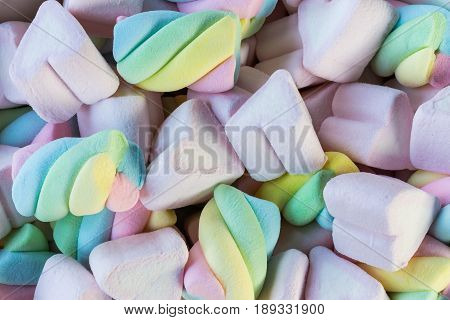 Closeup of colorful mini marshmallows background or texture.
