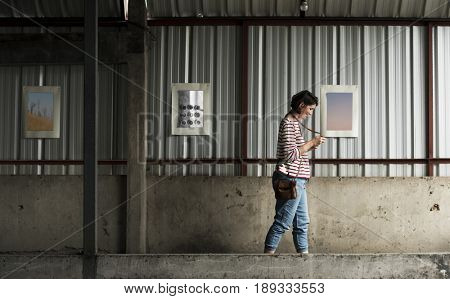 Woman traveler photographer holiday lifestyle trip