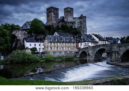 Runkel, Germany - April 23 2017: Burg Runkel during sunset with dramatic sky in Runkel, Hessen, Germany.