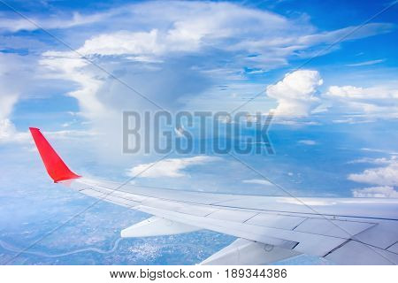 wing airplane and cloud on skyblue transportation