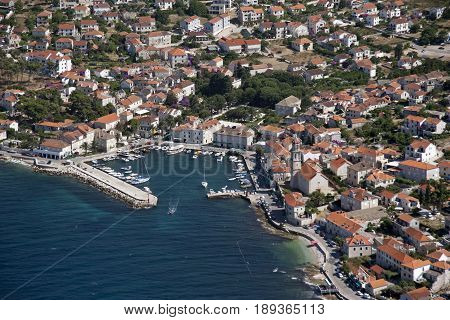 Sutivan settlement on northwest side of island Brac in Croatia view on port and coastline