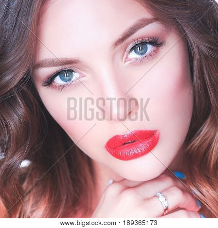 Beautiful woman skin with red lips on white background