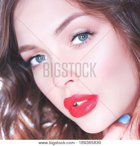 Beautiful woman skin with red lips on white background