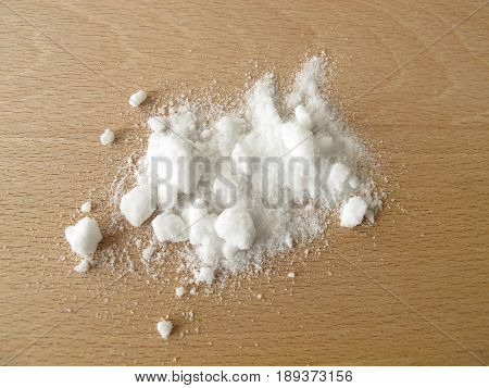 Baking ingeredient bakers ammonia powder on wooden board