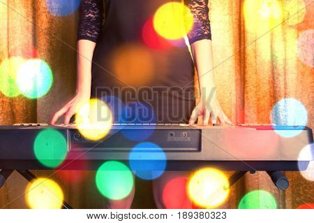 Unrecognizible Girl Musician Playing On Electronic Piano