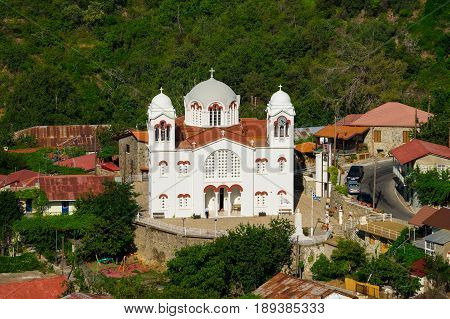 White church in Pedoulas village Troodos mountains