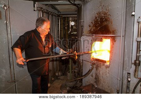 Worker During The Glass Processing