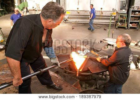 Workers During The Glass Processing