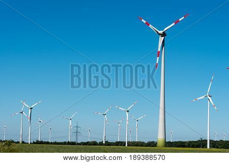 Wind farm with many wind wheels seen in Germany