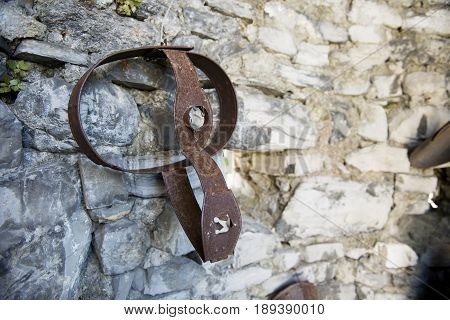 Varenna Italy - May 9 2017: Lake of Como ancient Chastity belt exposed to the castle of Vezio