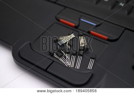 Transistors arranged on a laptop touch mouse