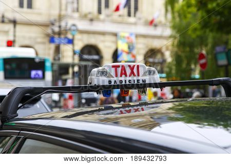 Closeup of taxicab sign in Paris France