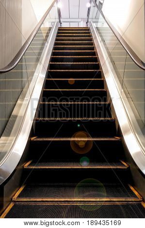Escalator Escalating from the Basement in a Building