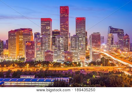 Beijing, China modern financial district skyline at dusk.