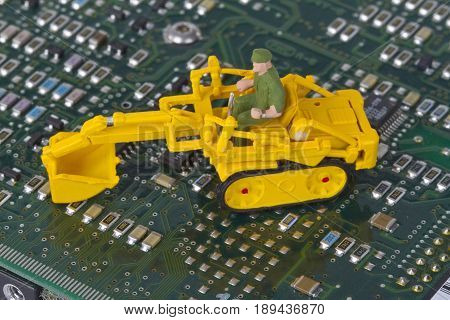 HDD with toy crawler mounted - data security concept.