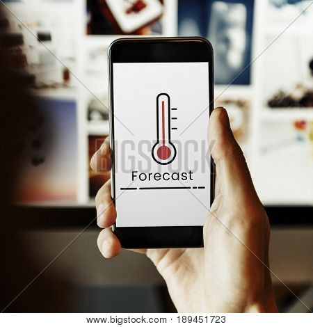 Hands working on digital device network graphic overlay