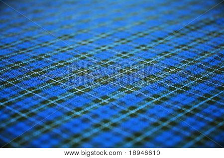 karierte blau keltischen Stil Stoff texturierter Hintergrund. Shallow DOF.