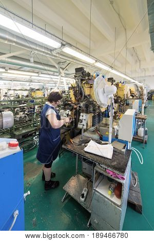MOSCOW, RUSSIA - FEBRUARY 21, 2017: Moscow shoe factory JSC RALF RINGER. Female workers make shoes at a shoe factory.
