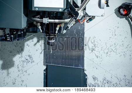Spindle modern high-precision CNC milling machine. The cartridge is mounted cutter pen. Tinted in cold industrial colors.