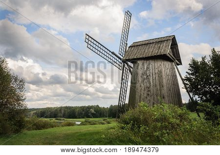 Country landscape with old windmill in Mikhailovskoe village Museum-reserve of A.S. Pushkin Pskov region Russia