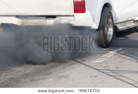 Race car burns rubber off its tires in preparation for the race