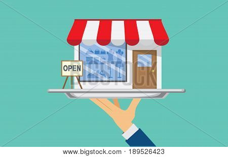 Hand holding silver tray which have a shop. This Illustration about SME concept.