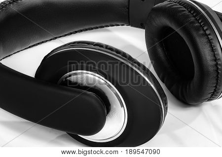 Black headphones isolated on a white background