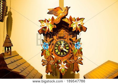 The detail of swiss wooden cuckoo clock